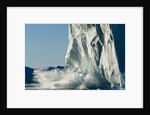 Calving iceberg in Disko Bay in Greenland by Anonymous