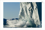 Calving iceberg in Disko Bay in Greenland by Anonymous