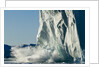 Calving iceberg in Disko Bay in Greenland by Anonymous