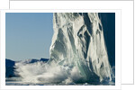 Calving iceberg in Disko Bay in Greenland by Anonymous