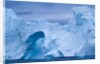 Hole melted in iceberg in Disko Bay in Greenland by Anonymous