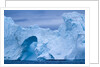 Hole melted in iceberg in Disko Bay in Greenland by Anonymous
