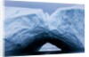 Arched iceberg in Disko Bay in Greenland by Anonymous
