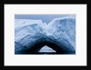 Arched iceberg in Disko Bay in Greenland by Anonymous