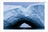 Arched iceberg in Disko Bay in Greenland by Anonymous