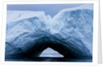 Arched iceberg in Disko Bay in Greenland by Anonymous