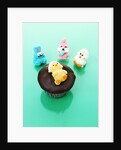 Muffin with chocolate icing and jelly chick for Easter by Anonymous