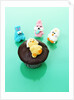 Muffin with chocolate icing and jelly chick for Easter by Anonymous