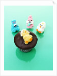Muffin with chocolate icing and jelly chick for Easter by Anonymous
