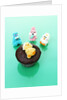 Muffin with chocolate icing and jelly chick for Easter by Anonymous