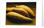 Yams on Wooden Table by Anonymous