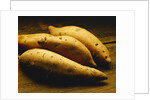 Yams on Wooden Table by Anonymous