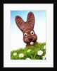 Chocolate Easter Bunny in Easter grass by Anonymous