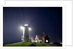 Nobska Light in fog at night by Anonymous