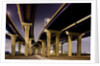 Highway overpasses at night by Anonymous