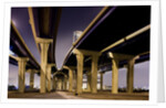 Highway overpasses at night by Anonymous