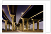 Highway overpasses at night by Anonymous