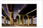 Highway overpasses at night by Anonymous