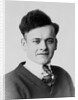 Young man smiles in a formal portrait, ca. 1920 by Anonymous