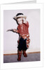 Little cowboy fires play six shooters, ca. 1956 by Anonymous