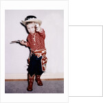 Little cowboy fires play six shooters, ca. 1956 by Anonymous