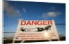 Warning sign near St. Maarten Airport, Netherlands Antilles by Anonymous