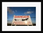 Warning sign near St. Maarten Airport, Netherlands Antilles by Anonymous