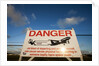 Warning sign near St. Maarten Airport, Netherlands Antilles by Anonymous