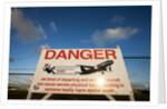Warning sign near St. Maarten Airport, Netherlands Antilles by Anonymous