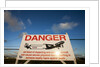 Warning sign near St. Maarten Airport, Netherlands Antilles by Anonymous