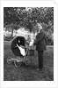 Woman in men's' clothes with a stroller at a baby shower, ca. 1924 by Anonymous