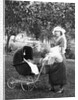 Mother to be with stroller at baby shower, ca. 1924 by Anonymous