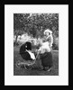 Mother to be with stroller at baby shower, ca. 1924 by Anonymous