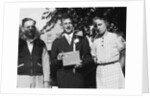 Boy with his parents on his 8th grade graduation, ca. 1940 by Anonymous