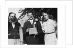 Boy with his parents on his 8th grade graduation, ca. 1940 by Anonymous