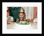 Grumpy boy at fifth birthday party, ca. 1957 by Anonymous
