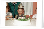Grumpy boy at fifth birthday party, ca. 1957 by Anonymous