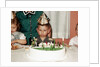 Grumpy boy at fifth birthday party, ca. 1957 by Anonymous