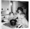 Mom prepares dinner with the kids watching, ca. 1962 by Anonymous