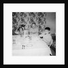 Father with children at the dinner table, ca. 1962 by Anonymous