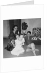 Mother with son and daughter in living room, ca. 1960 by Anonymous