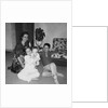 Mother with son and daughter in living room, ca. 1960 by Anonymous