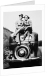 Couple proudly sits on their new car, ca. 1935 by Anonymous