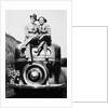 Couple proudly sits on their new car, ca. 1935 by Anonymous