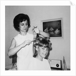 Mother helps 16 year old daughter get ready for date, ca. 1970 by Anonymous