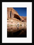 Stand-up paddleboarding on Lake Powell, Utah by Anonymous