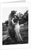 Woman embraces a stuffed bear, ca. 1940 by Anonymous