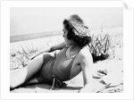 Young woman at the beach, ca. 1938 by Anonymous