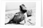Young woman at the beach, ca. 1938 by Anonymous