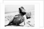 Young woman at the beach, ca. 1938 by Anonymous